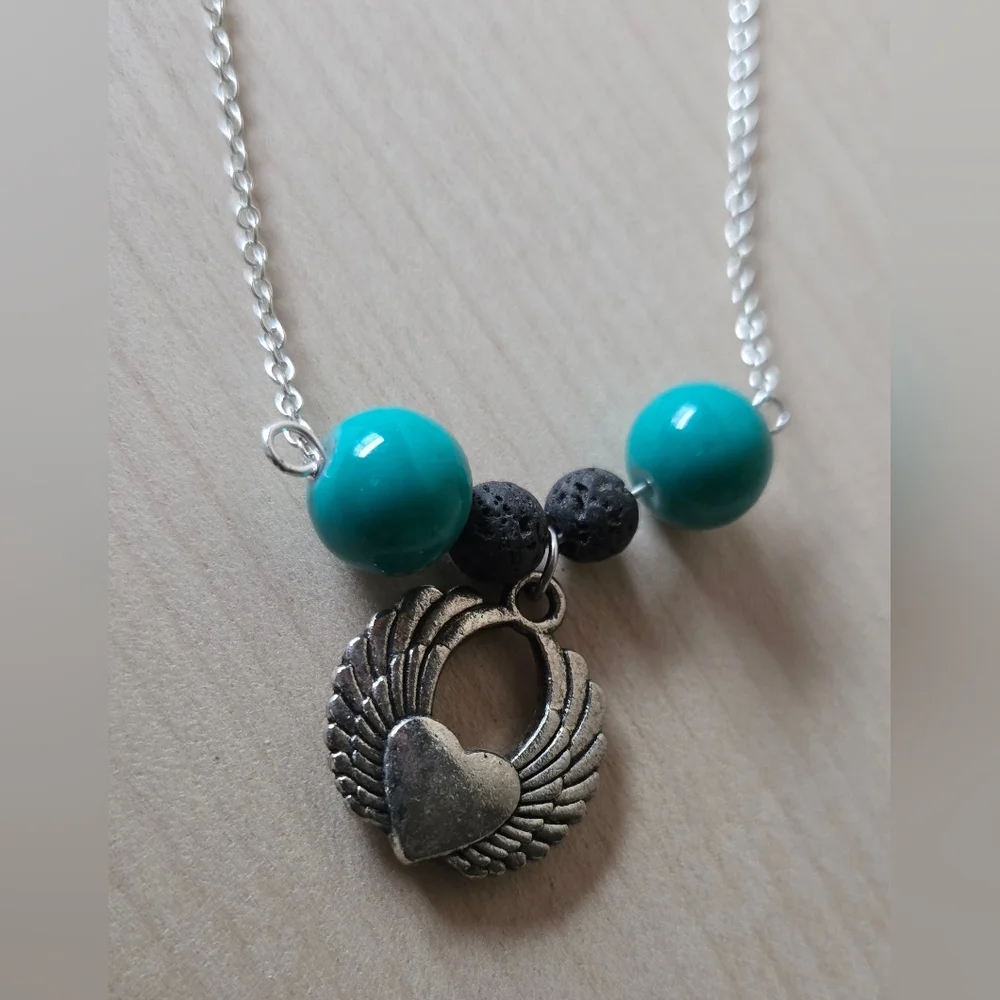 Silvertone Winged Heart Aromatherapy Necklace with Turquoise Beads